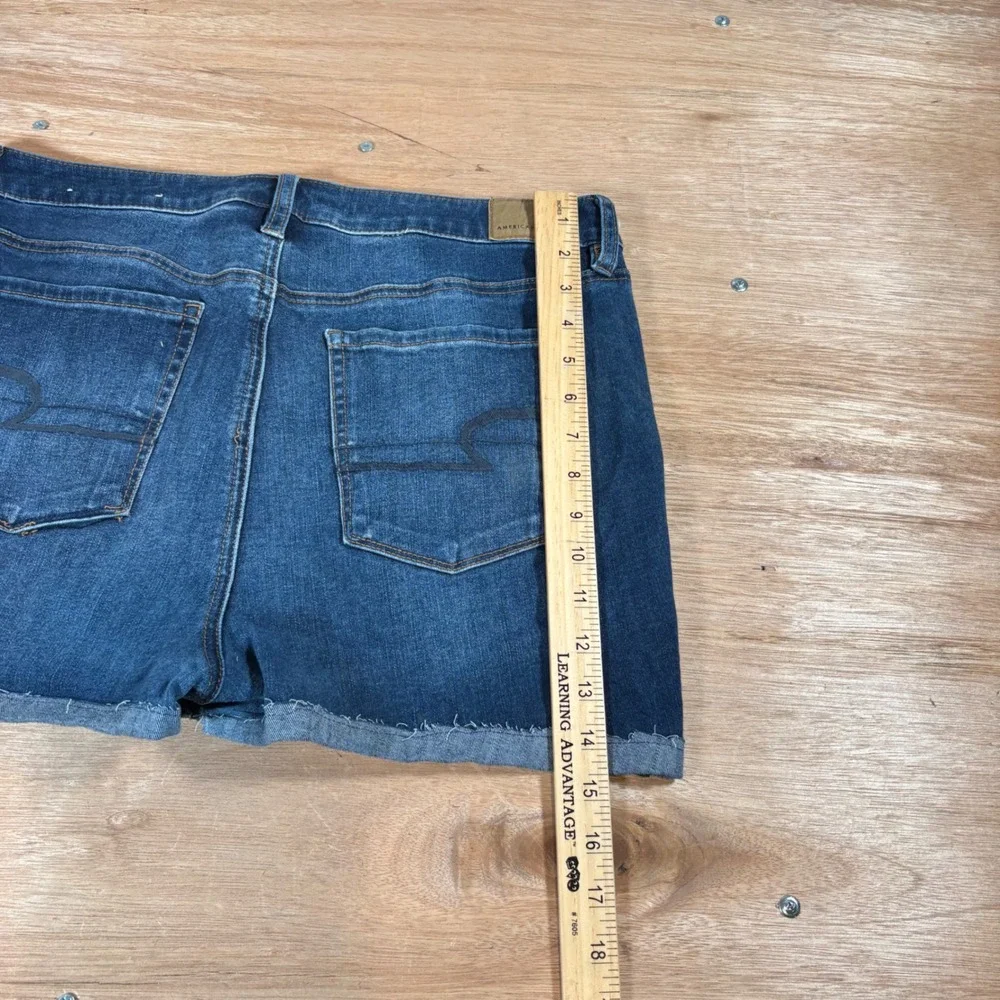 American Eagle Next Level Stretch Denim Shorts Medium Wash Raw Hem Size 14 Long